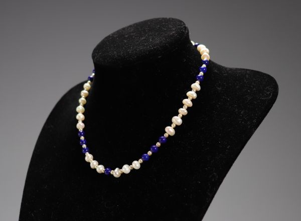 Collier en perle monture en or (14k) (18.2 gr)