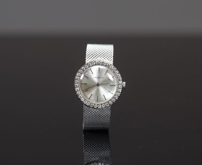 Juvenia Montre-bracelet de dame en or gris et diamants