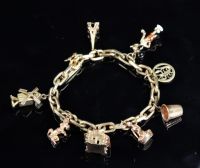 Bracelet et pendentifs en or jaune 18k (32.79gr)