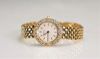 Montre Chopard or (18k) et diamants