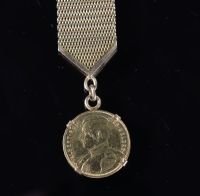 Pièce or 20frs Roi Albert 1914 et monture en or ( 24.06gr)